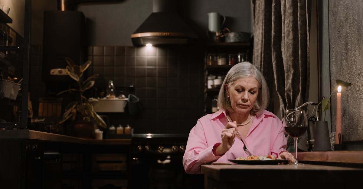 Eating alone in London - An Elderly Woman Eating Alone at Home