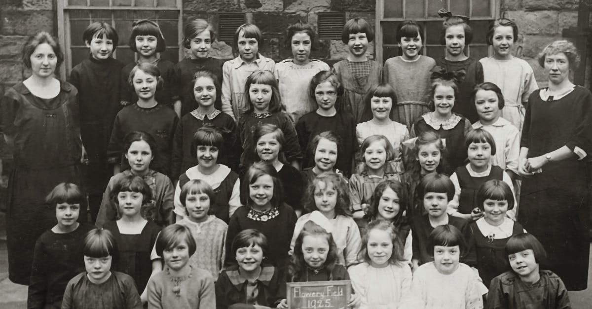 Education history in DS160 -  Photo Of A Class Picture In Grayscale