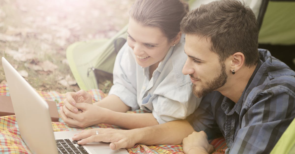 EEA Family Permit Access UK or Visa4uk? [closed] - A Happy Couple Using Computer Laptop