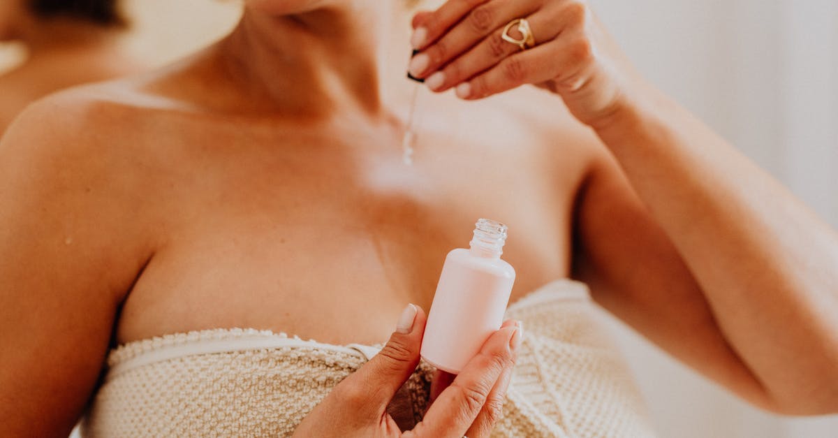 EHIC, applying for a refund - Woman Holding White Plastic Bottle