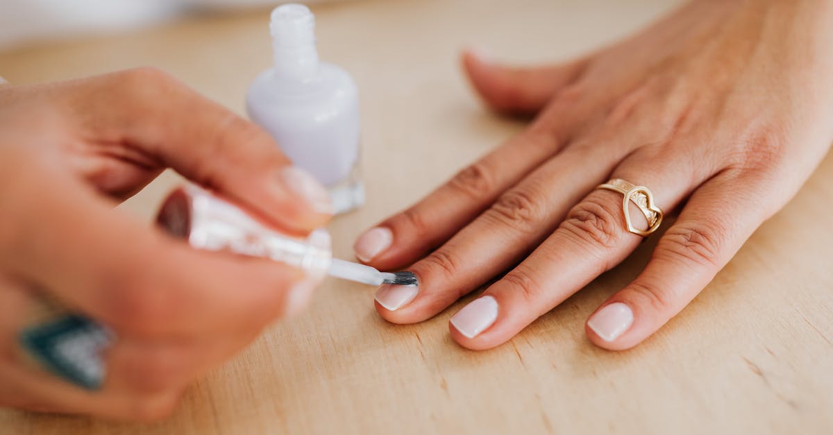 EHIC, applying for a refund - Person Holding White Plastic Bottle