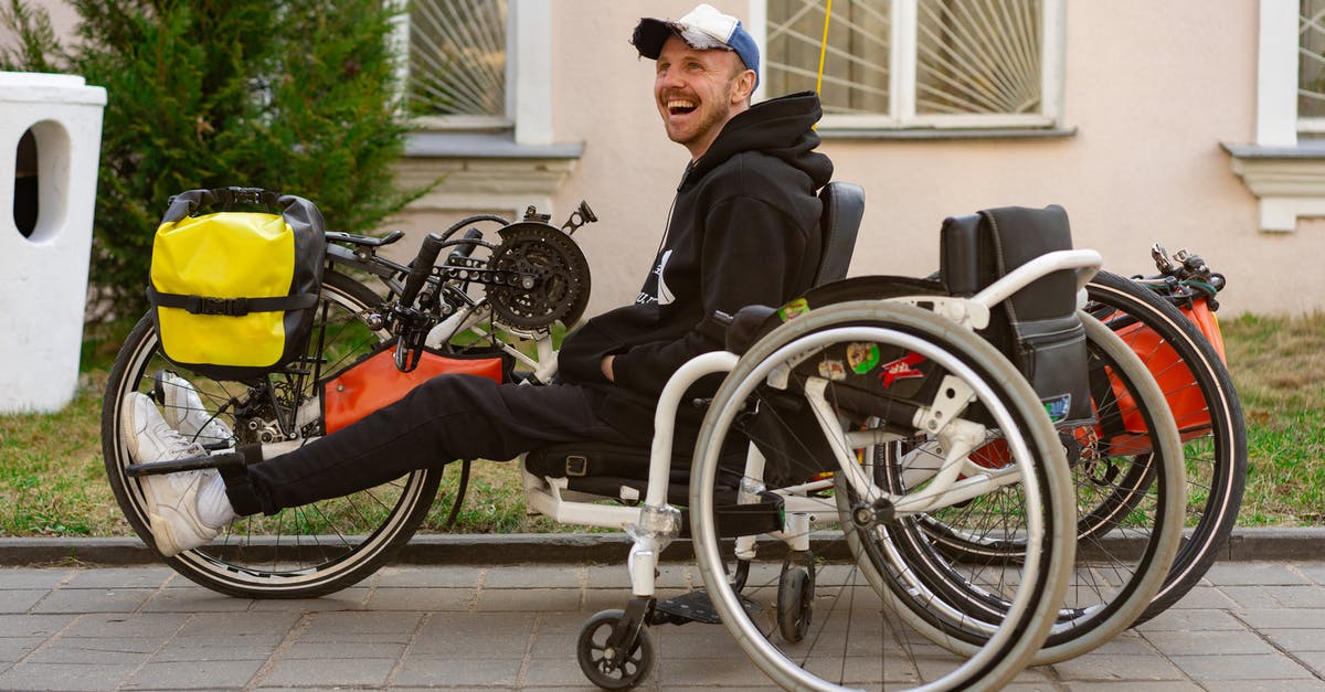 Electric wheelchairs hire in Cologne - A Man Riding a Electric Wheelchair