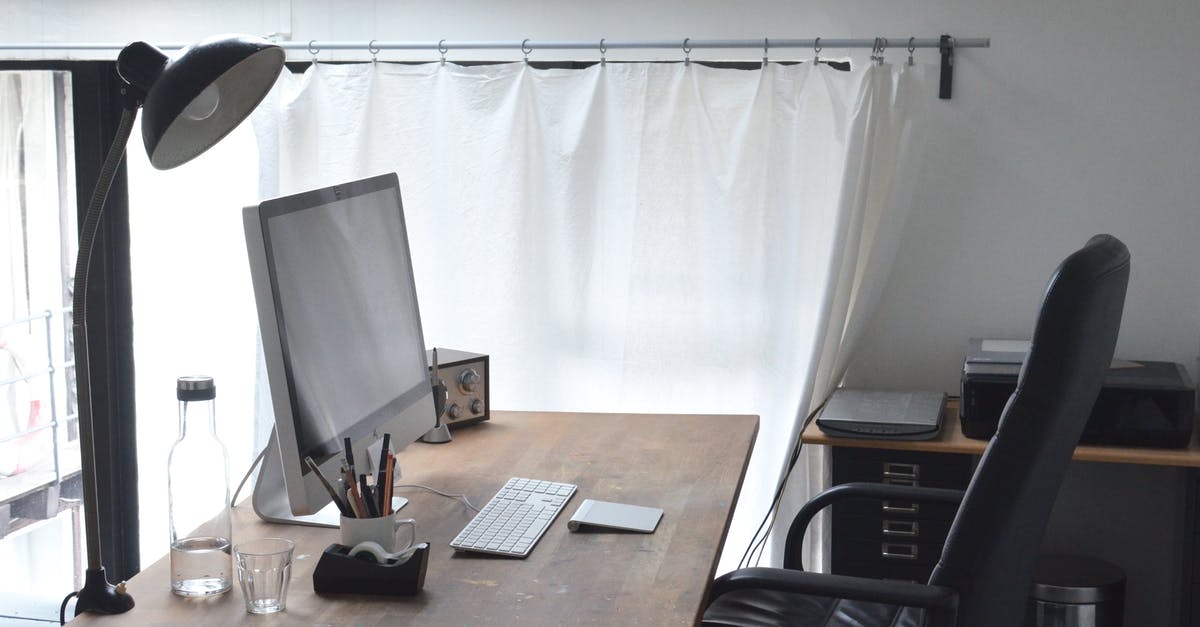 Electronic ticket with no printer - Workspace with computer and lamp composed with radio and stationery