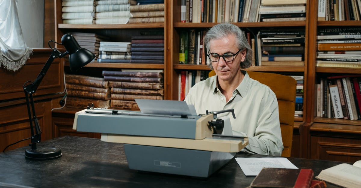 Employment and Education Documents with IM5252e - An Elderly Man Typing on a Vintage Typewriter