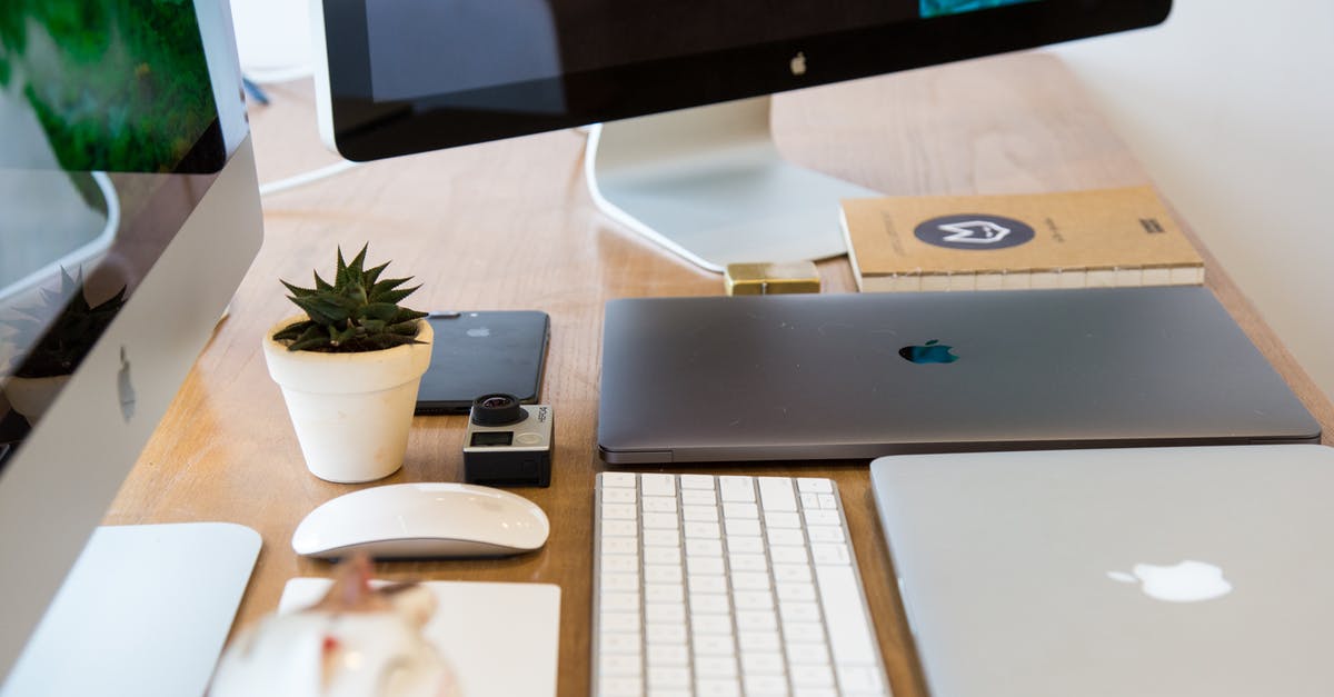 Enable Internet access on the go in Ireland - Windows Flat Screen Computer Monitor Beside Two Silver Macbooks