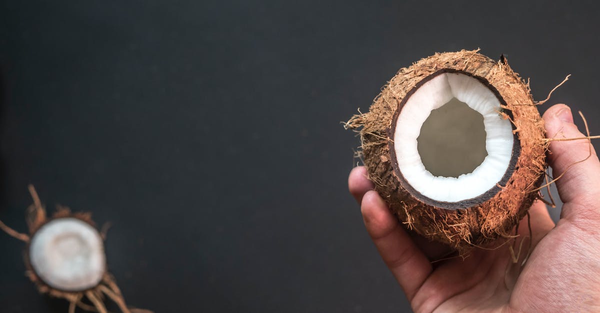 Enter the Schengen Space if I hold an onward ticket - Person Holding Opened Coconut