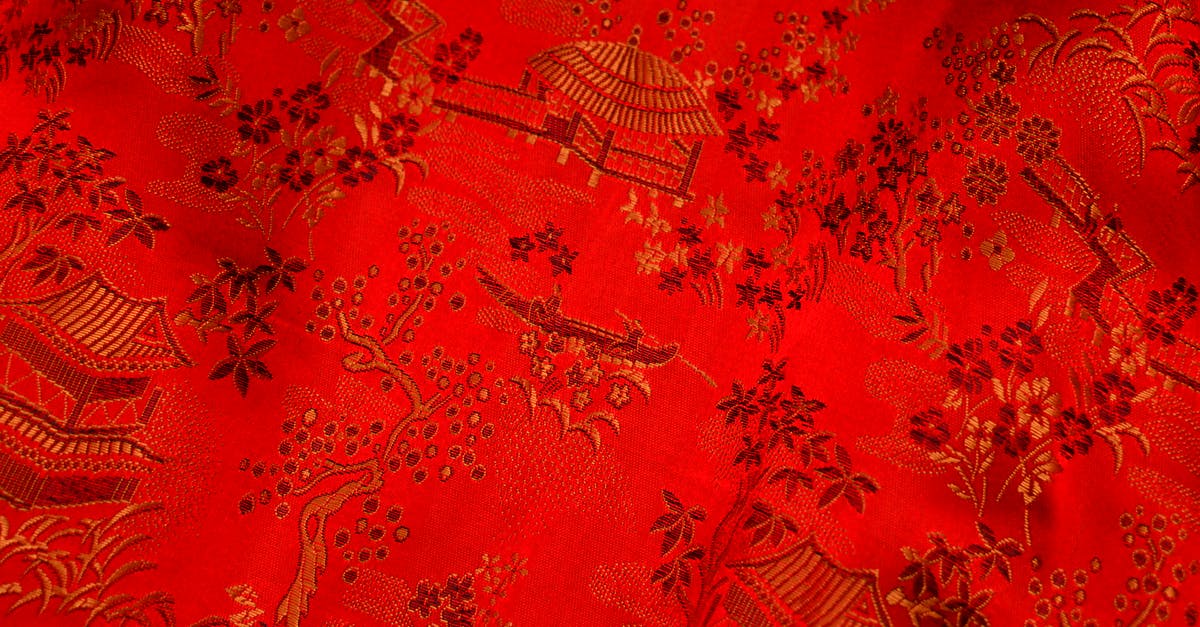 Entering Australia with 3 different nationalities? - Background of bright fabric with oriental design of tree and floral pattern with traditional huts elements on thick decorated textile