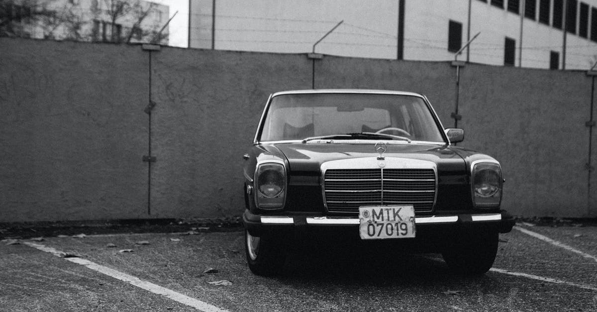 Entering Germany with COVID-19 border regulations - Black Vehicle Parked Near Concrete Wall in Grayscale Photography