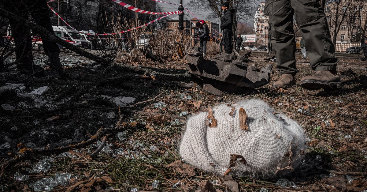 Entering Ukraine as a Ukrainian born, naturalised British citizen - Knitted Hat Lying among Debris in Ukrainian City