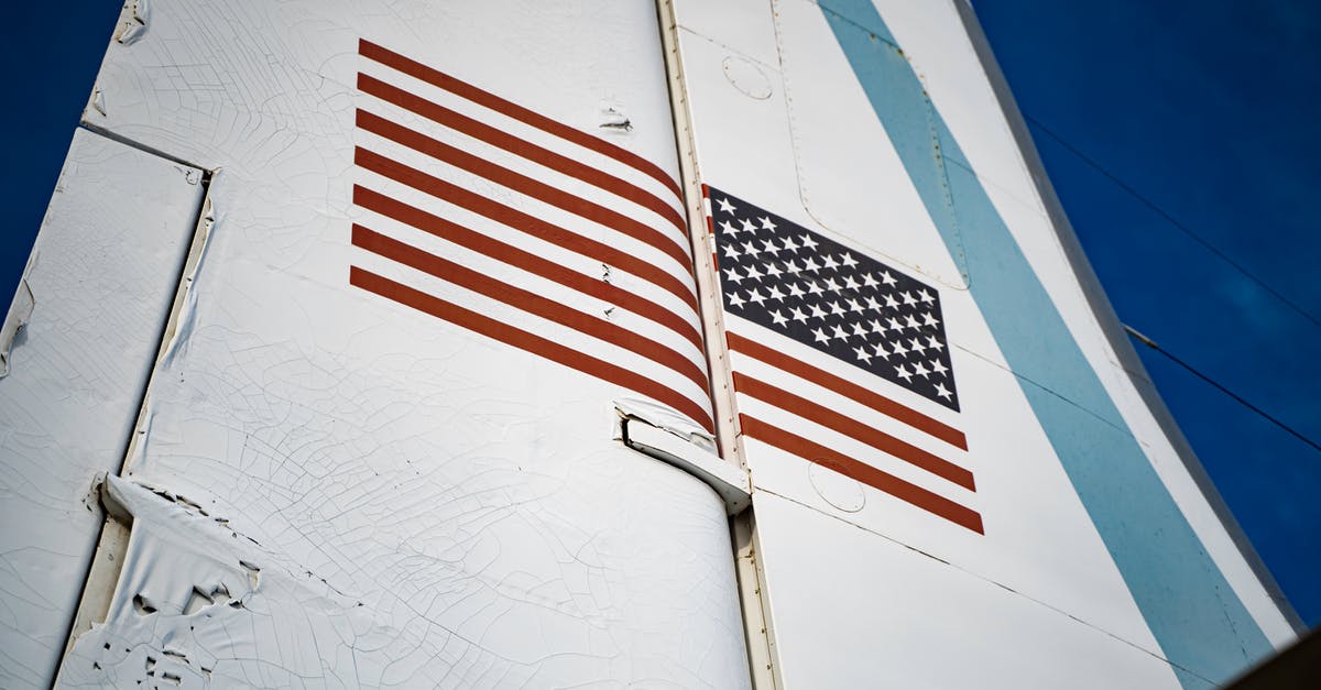 Entering USA with overstay in the past - White and Red Airplane in the Sky