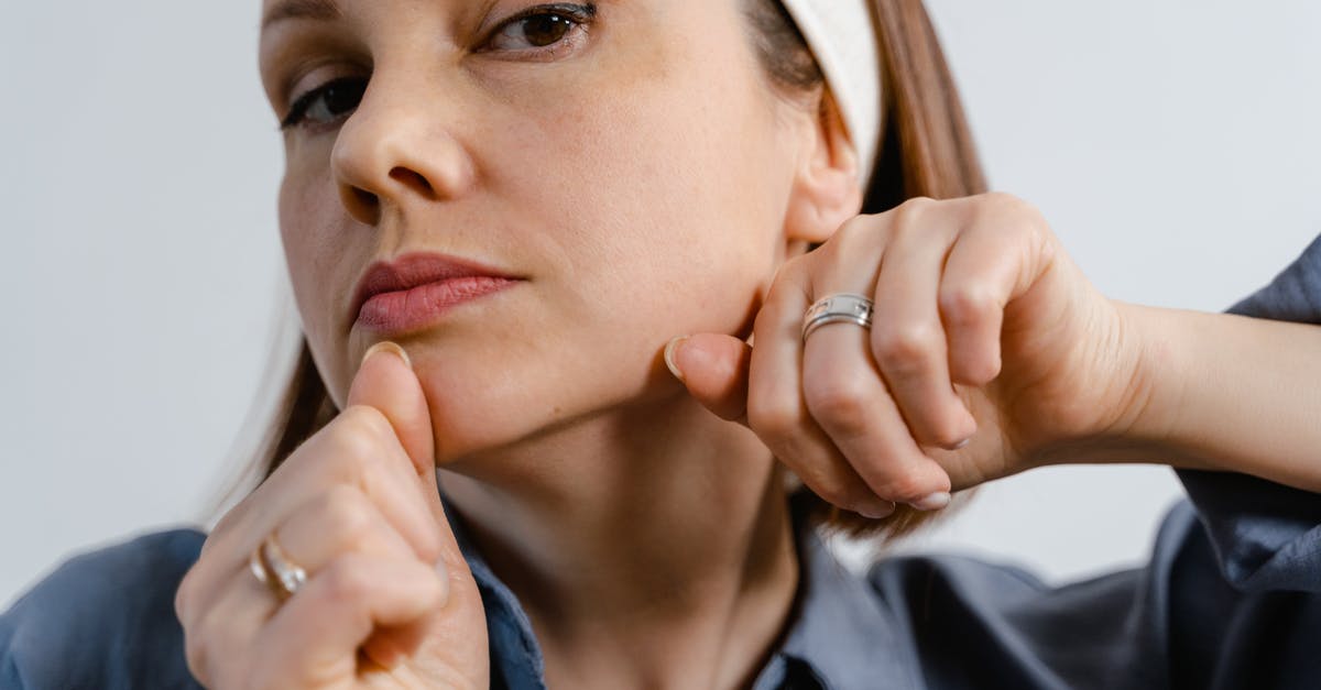 Entry procedure to Korea (long term stay?) [closed] - Woman in Blue Collared Shirt Wearing Silver Ring