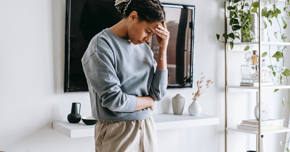 ESTA 90 day problem - African American woman standing in light room