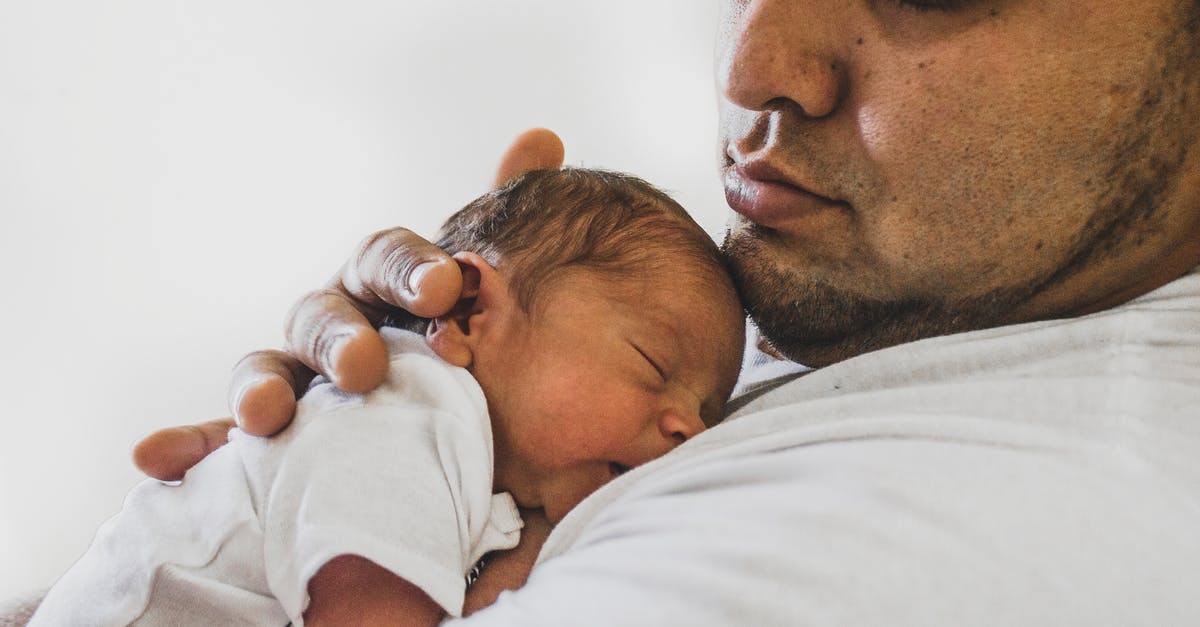 ESTA (Going to Mexico and the US) [duplicate] - Photo Of Father Carrying Newborn Baby