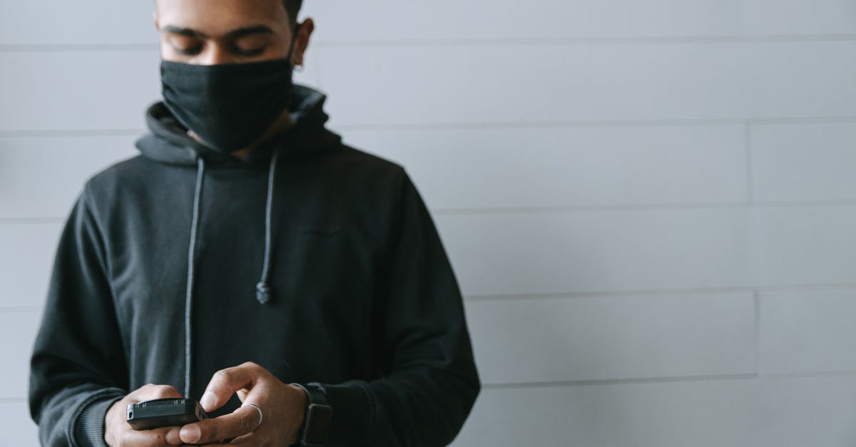 ESTA payment not processed - A Man Wearing a Black Hoodie using a Terminal