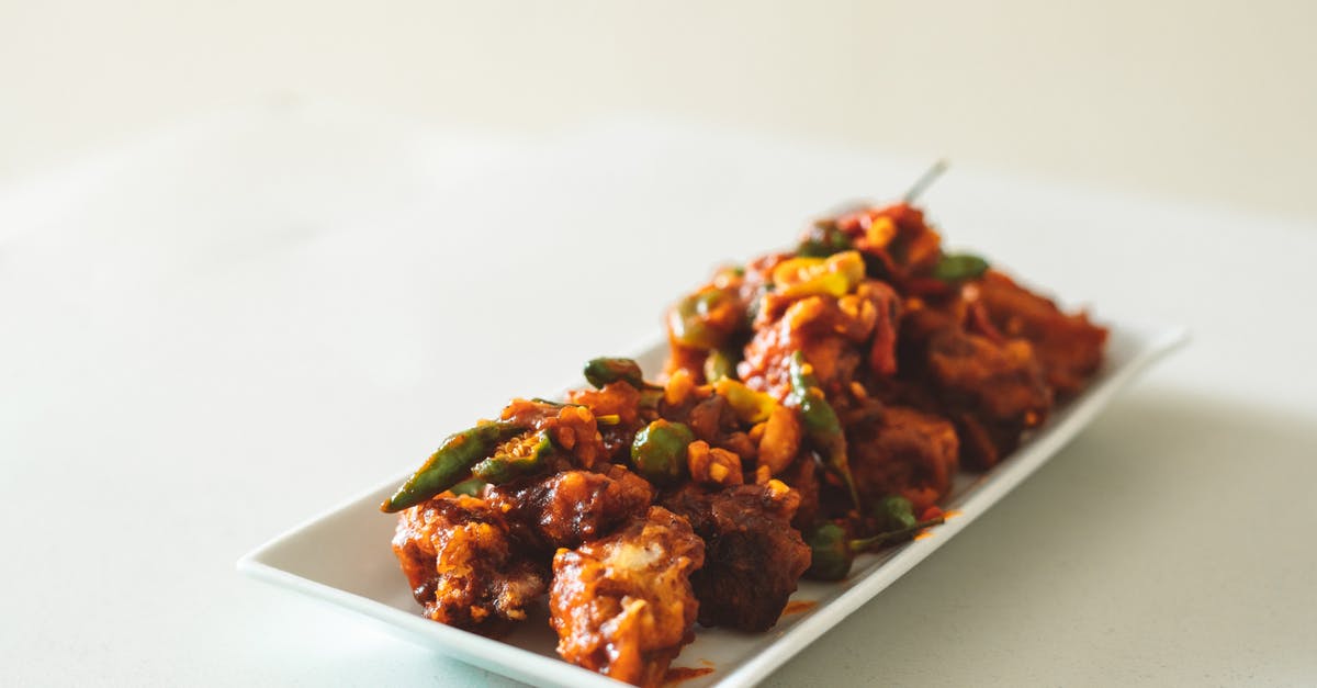 E-Ticket in Chinese Language - Cooked Food on White Ceramic Plate