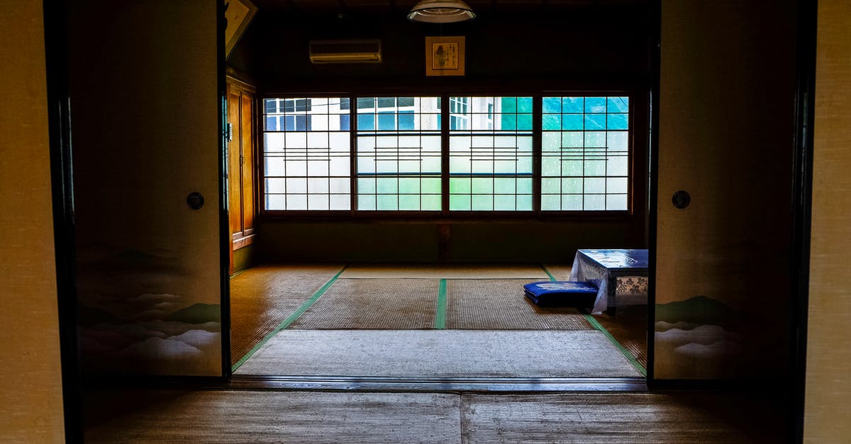 Etiquette in Japanese Ryokan vs. Capsule Hotel - Room With Table and Windows