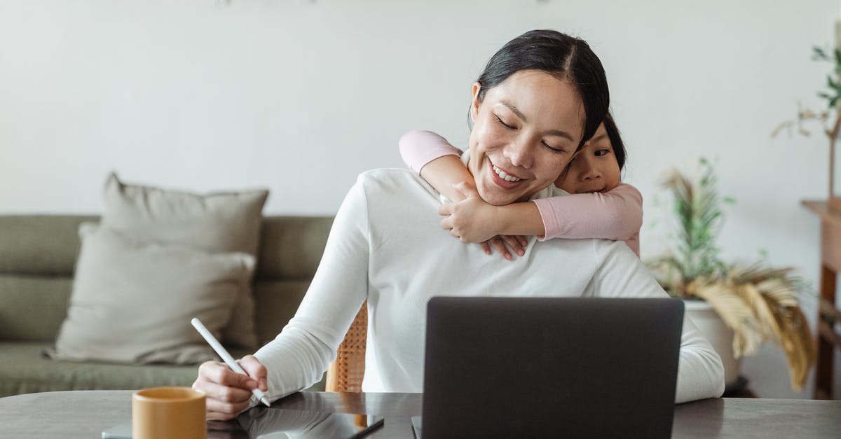 EU261, cancelled connection and predating duty of care - Happy mother working from home and little daughter hugging mom