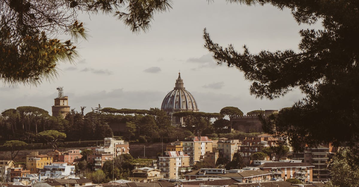 EU resident and 90-day rule in Italy - Picturesque scenery of residential buildings with trees located in Monte Ciocci framed by conifers