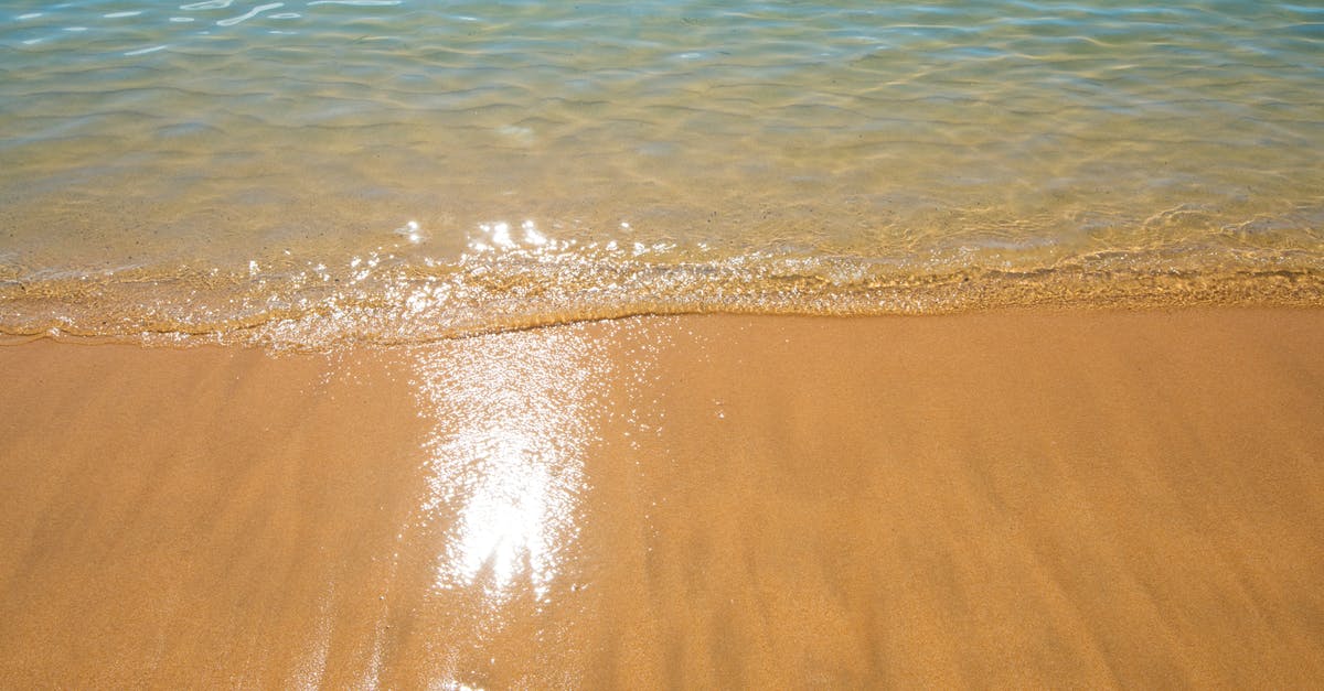 EU Travel at the end-of-year [closed] - beach water ocean blue,background,yellow sand and blue water