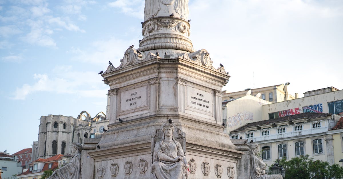 Europe vacation - best places to see based on certain preferences? [closed] - Bottom of Column of Pedro IV in Lisbon on sunny day