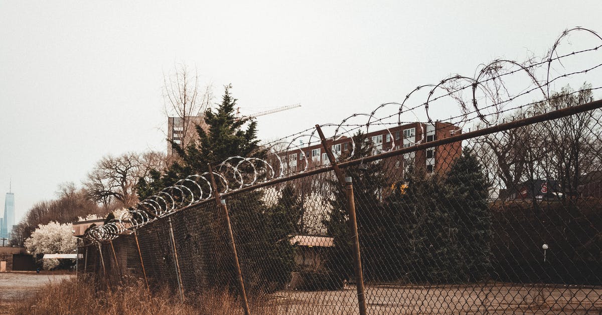 Eurostar security control: Taking pocket knife for camping - Barbed Wire Above the Mesh Wire Fence