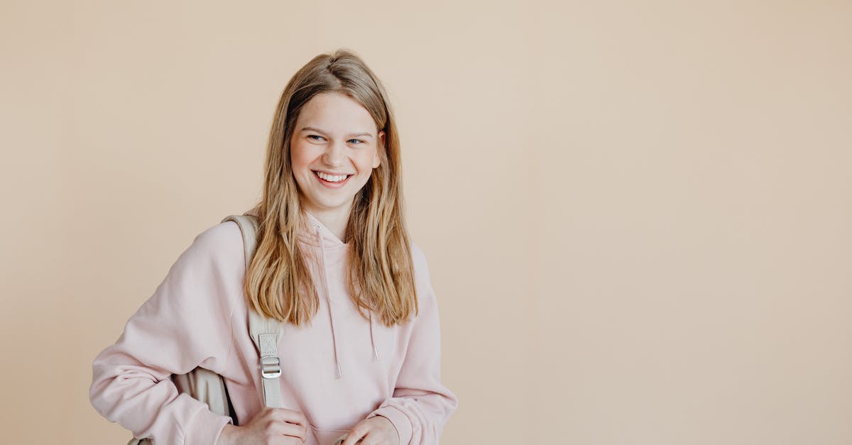 Evidence of source of funds as a student - Woman in White Coat Smiling