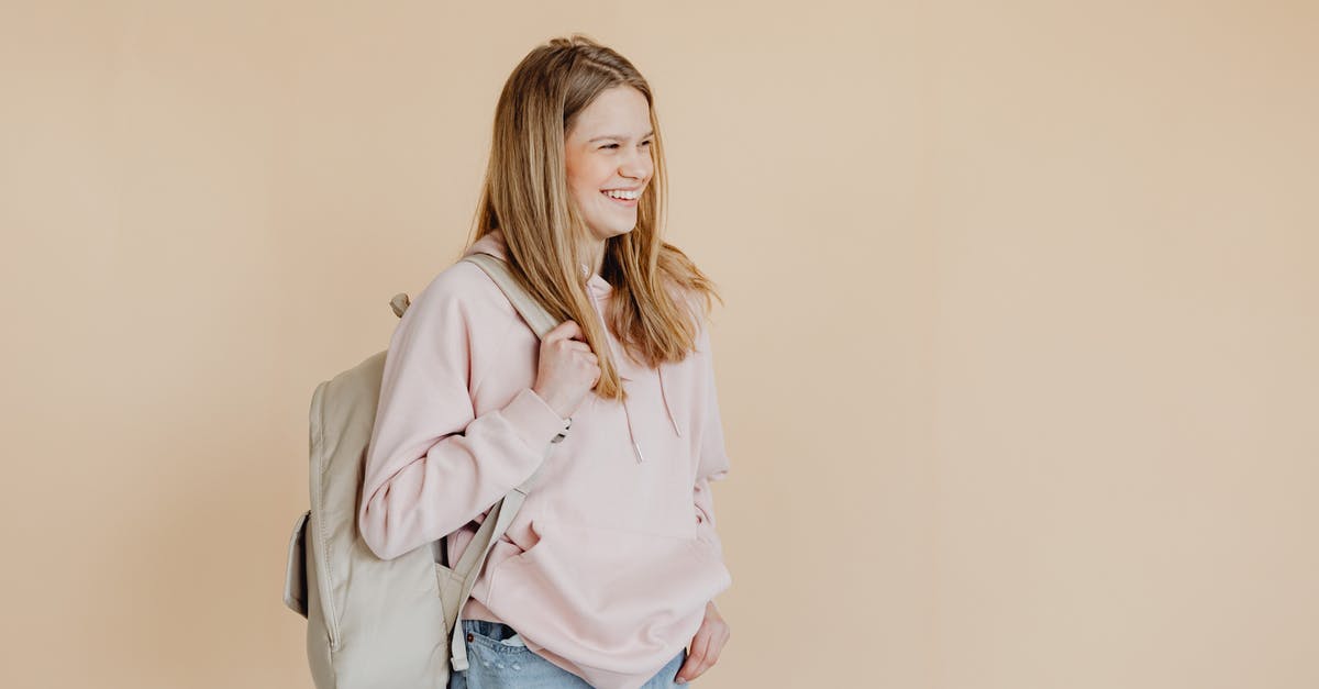 Evidence of source of funds as a student - Woman in Pink Jacket and Blue Denim Jeans