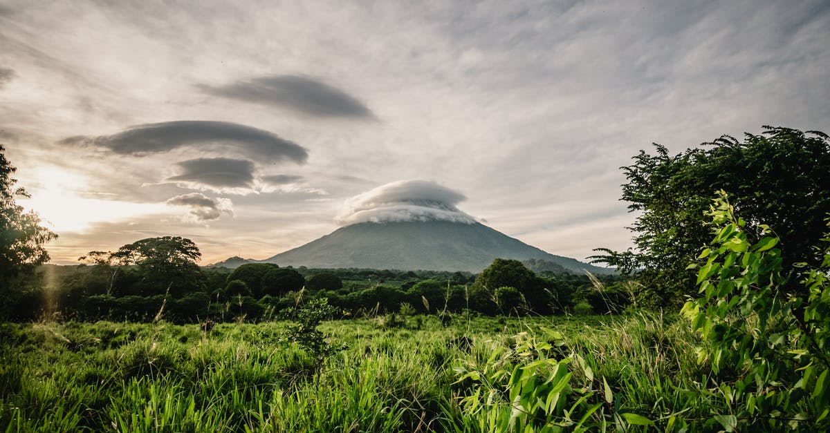 Exchanging Costa Rican Colones in Nicaragua - Photo Of Mountain During Dawn 