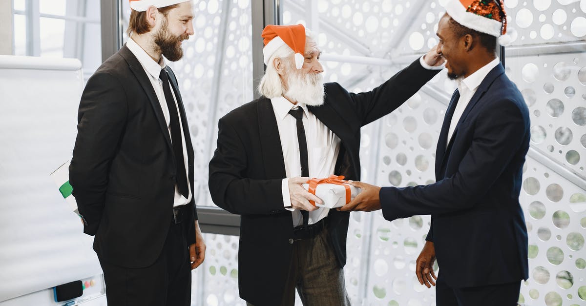 Exchanging South Korean Won for Turkish Lira [duplicate] - Man in Black Suit Holding Man in Black Suit