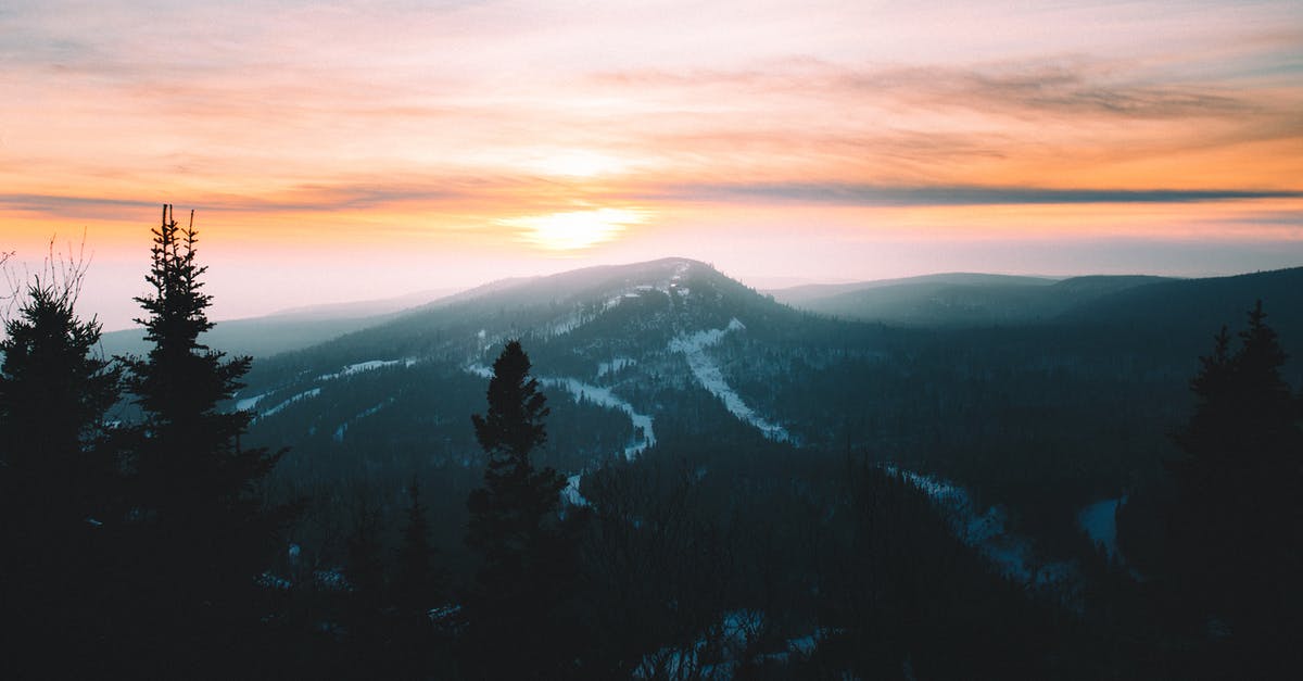 Exiting/entering the US - minor's US passport expired [duplicate] - Scenic Photo Of Mountain During Dawn 