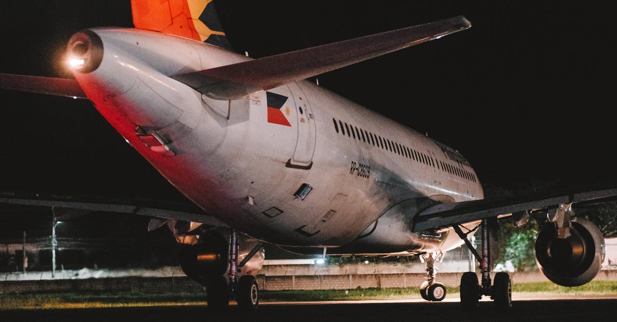 Expedited exit clearance certificate in the Philippines - White and Red Passenger Plane