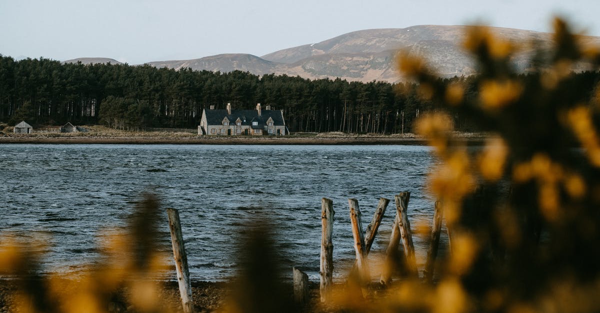 Experiencing Scotland in the Winters [closed] - People on Boat on Lake