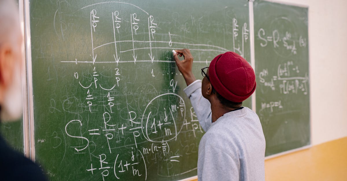 Expired permesso, but valid student visa [duplicate] - Man in Red Cap and Gray Shirt Writing on Chalk Board