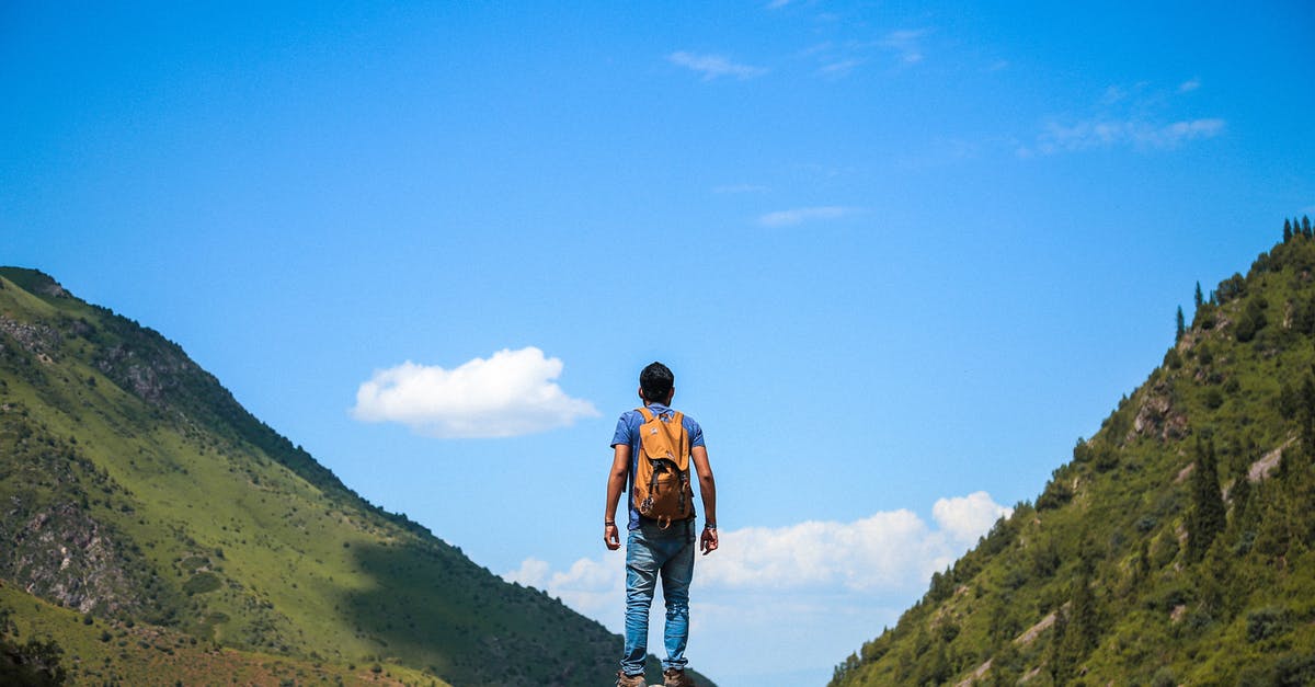 Exploring Mainland UK with an Isle of man visa - Man on Top of Mountain