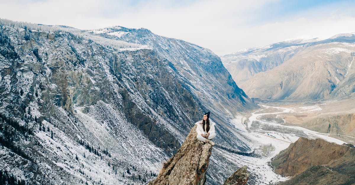 Exploring Russia on my own - legal? - A Woman Sitting on the Rock