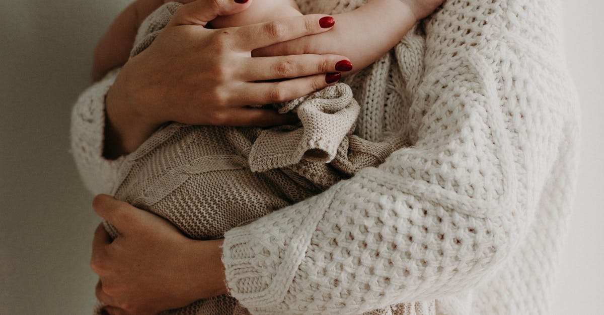 Family Hotels in Ireland? [closed] - Mother Holding Her Baby