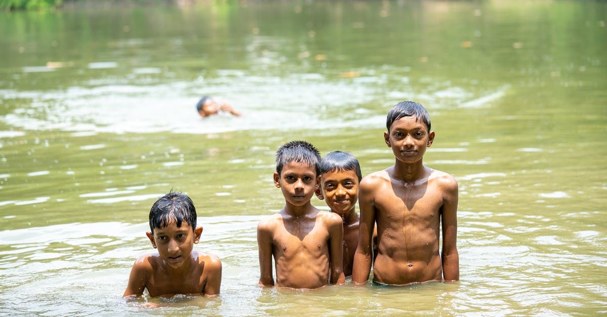 Family travel in Thailand - is it safe, can we improvise? - playing in the water with one spilled child