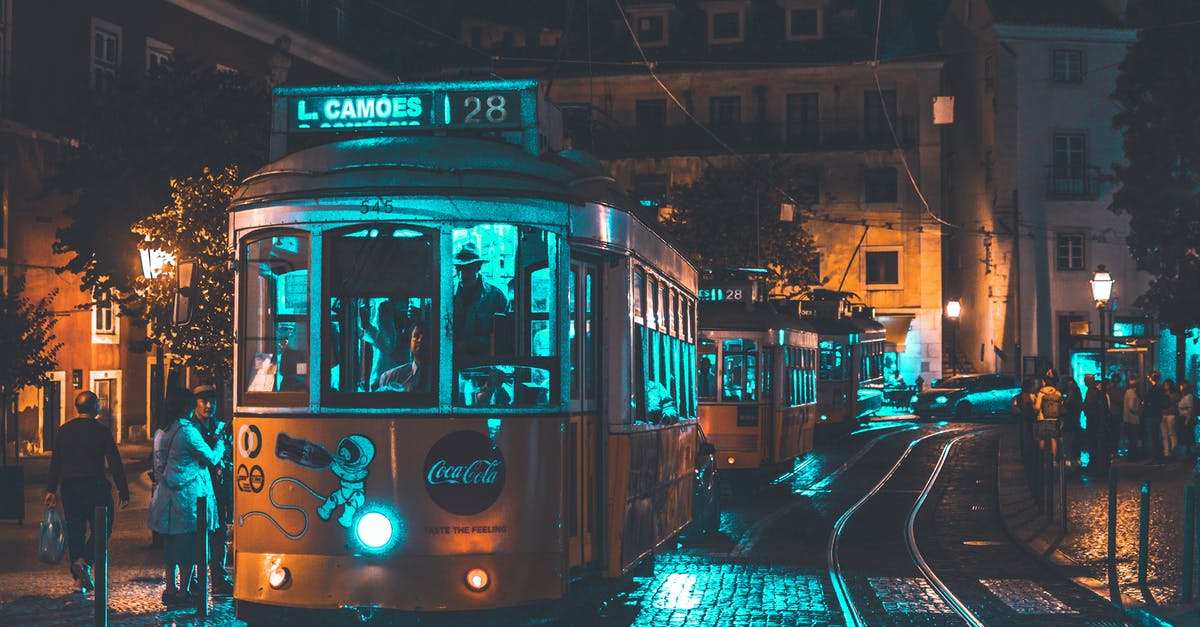 Fare calculator for travel in greater Lisbon? - Photo of People Riding on City Tram