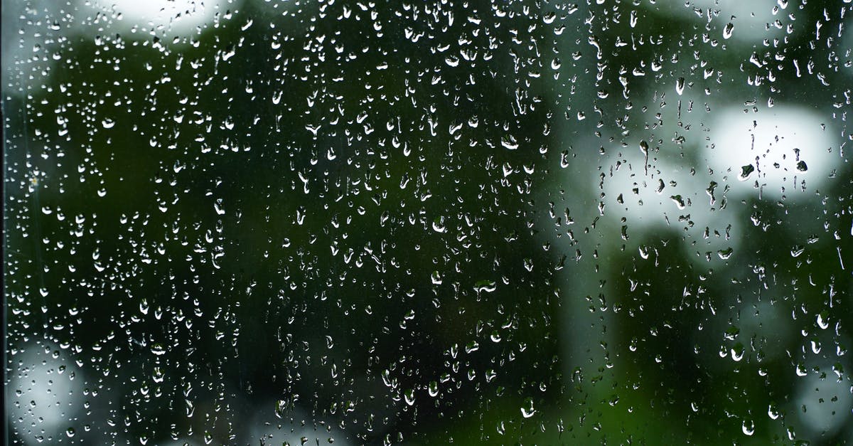 Fast and free Wi-Fi spot in Gaborone - Glass wall with water flows and drops