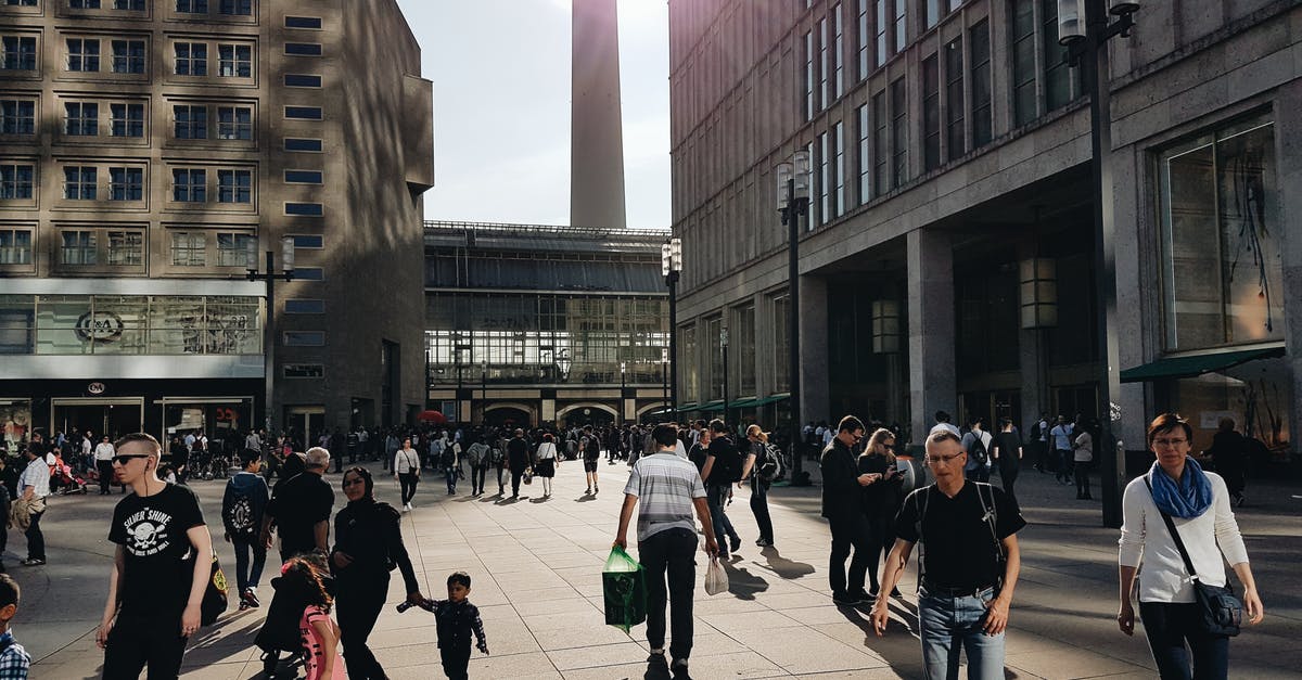 Fastest road from Berlin to Düsseldorf? - Man in Black Crew-neck T-shirt Walking Near Building