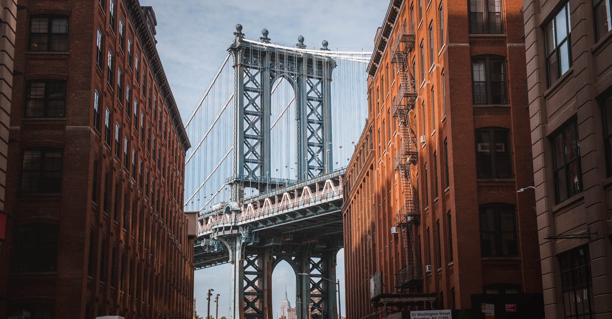 Fastest/cheapest New York airport to get to Brooklyn - Manhattan Bridge Seen Between Buildings