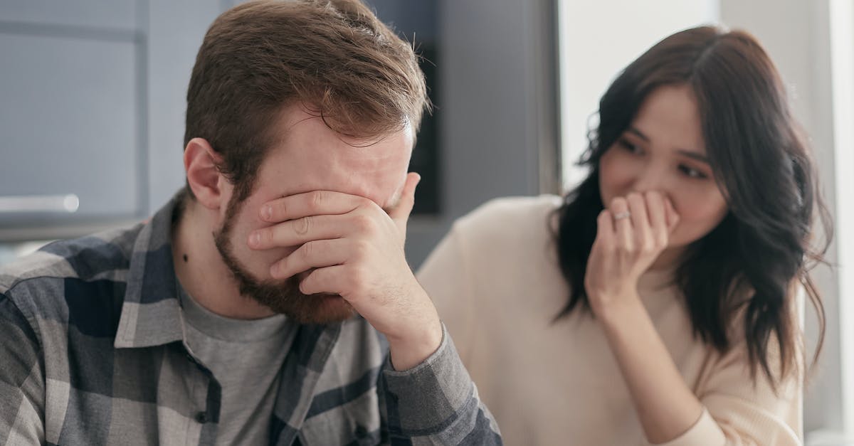 Filipino Wife visiting England with English Husband - Man in a Plaid Shirt Covering His Face