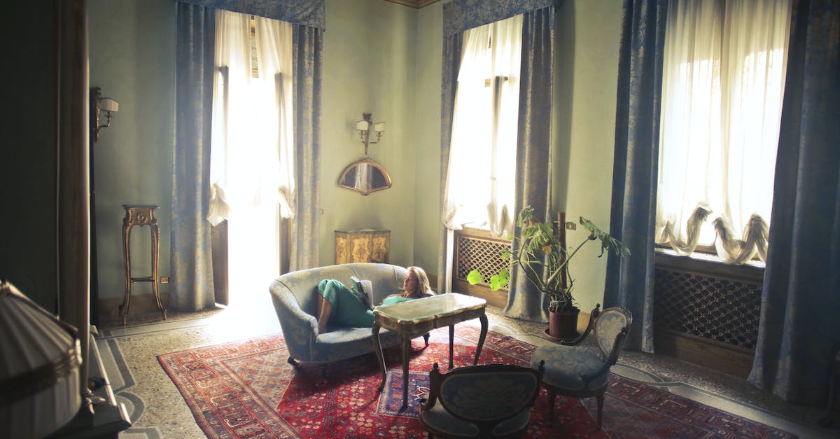 Finding a quiet hotel in Madrid - Woman reading book in living room