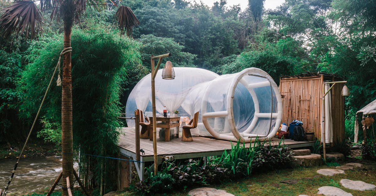 Finding convents and monasteries to stay in while travelling? - Exterior of cute bubble tent in tropical garden