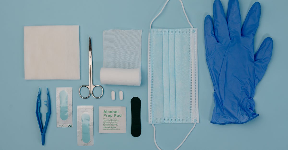 First aid scissors confiscated by Dubai airport security - A Set of First Aid Kit Tools on Blue Surface