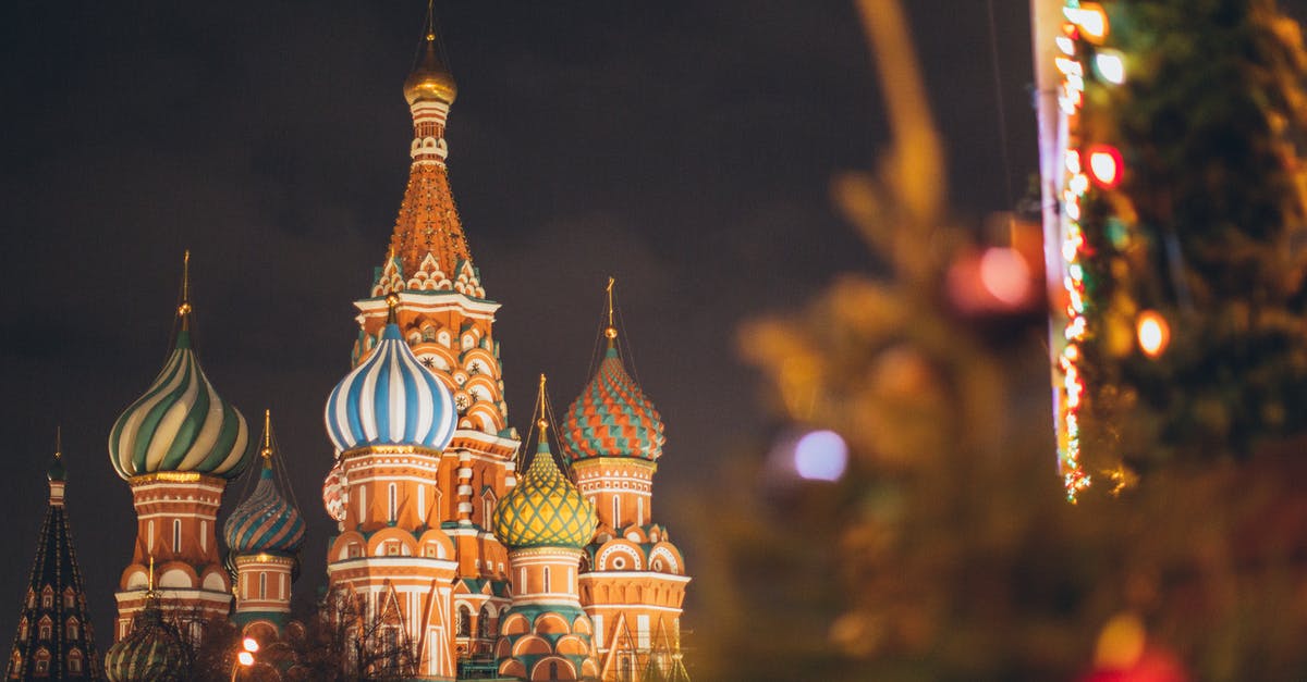 First entry in a city not associated to Russian visa - Famous Cathedral of Vasily Blessed on Red Square against dark cloudy evening sky during Christmas holidays in Russian Federation