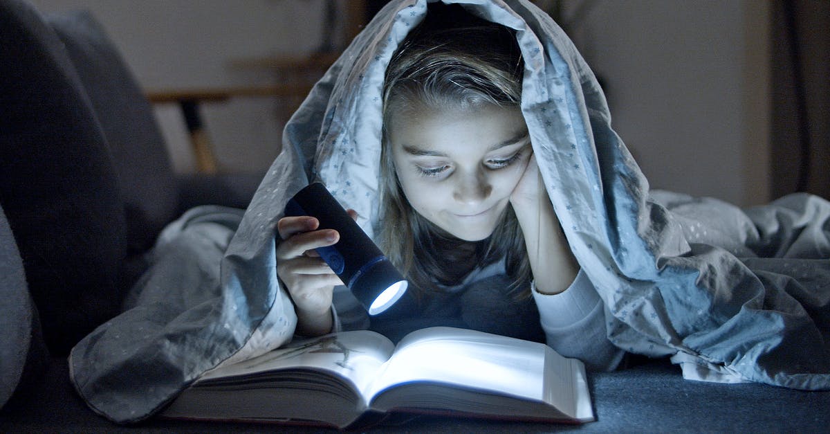 First time traveler: how do I book flights? - Young Girl Reading a Book