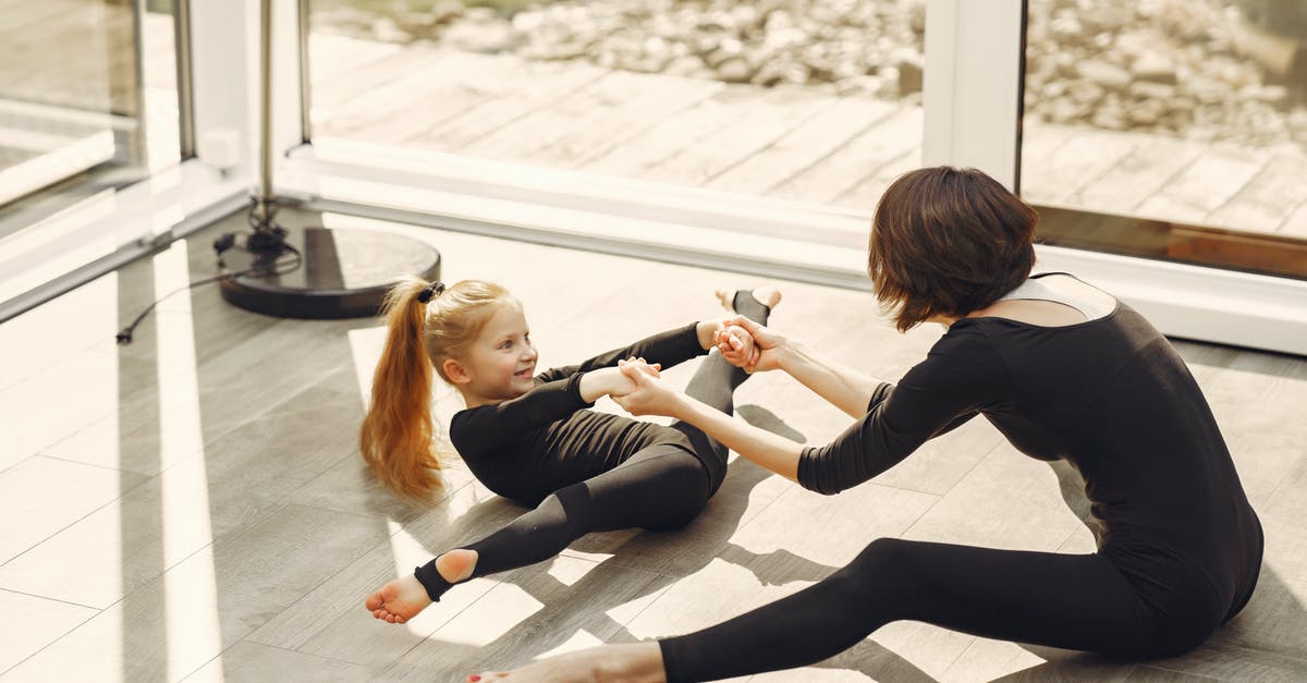 Flexibility in timing on pre-booked nsb.no train tickets? - Woman and Little Girl in Black Long Sleeve Shirt and Black Leggings Doing Split