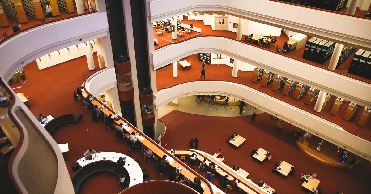 Flying from Toronto to Mumbai via Newark - Interior of elegant spacious multistory library