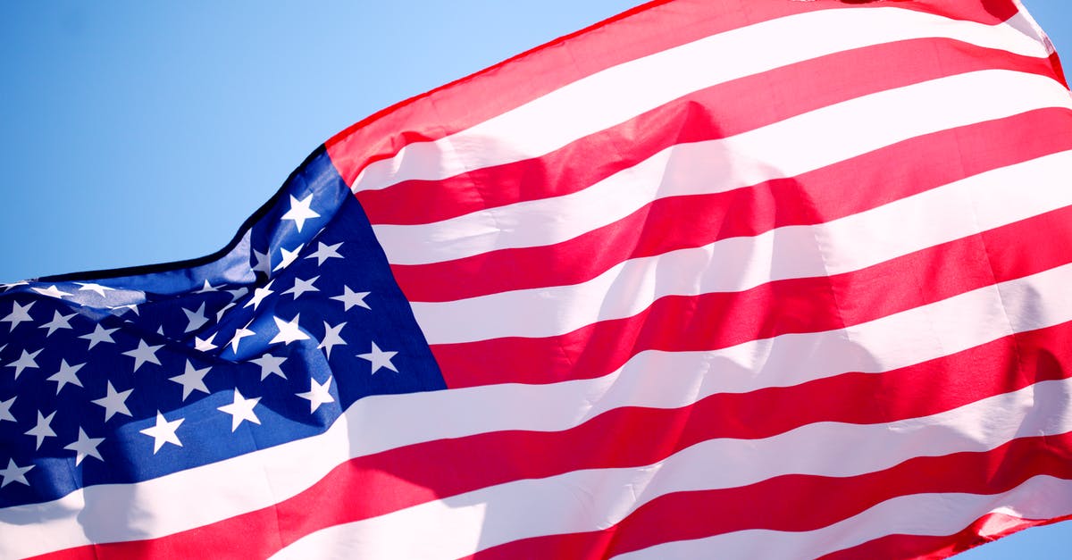 Flying over country from which you are deported - American Flag Under Blue Sky